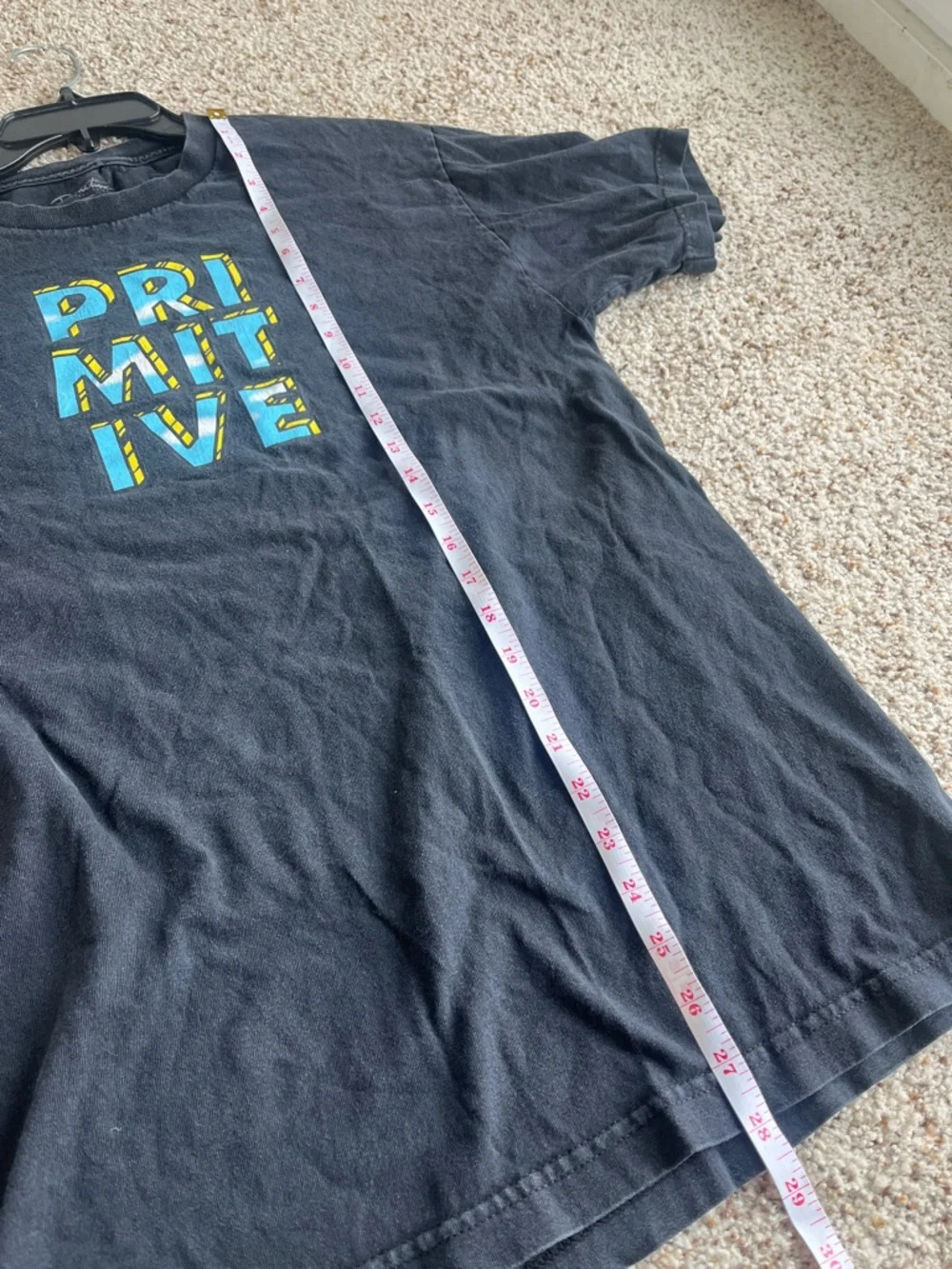 Primitive Black Tee with Blue and Yellow Block Logo